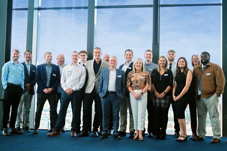 The Armstrong Bell team. Will Copley centre